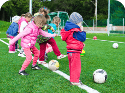 toddlers playing football photo